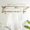24" X 6" Modern Finish Aluminum Wall Hook Shelf Brass - Olivia & May -Furniture Specialty Store GUEST 918f41f5 bb25 417d 85d4 0edd19365122