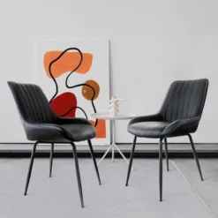 Elama 2 Piece Faux Leather Tufted Chair In Black With Black Metal Legs -Furniture Specialty Store GUEST 9b24c88b 12d1 4ea7 b5d5 7d8a2464c551